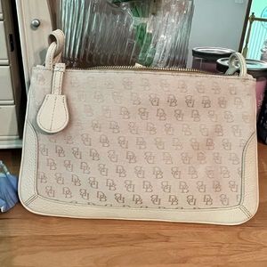 Dooney & Bourke crossbody in cream.